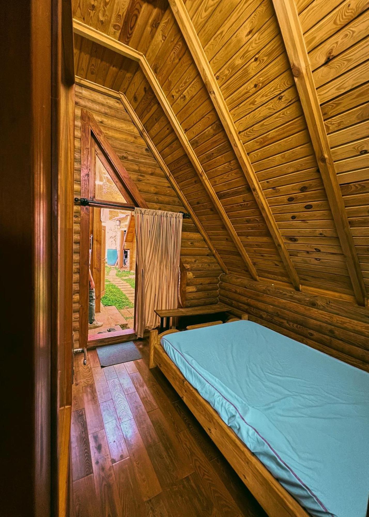 Nha Bao La - Ho Dak Long Thuong Hotel Бао Лок Екстериор снимка